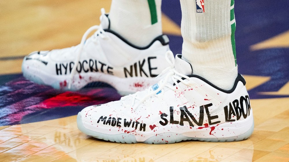 Boston Celtics center Enes Kanter wore sneakers designed by dissident artist Badiucao that label Nike a "hypocrite."
