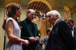 Prince William—seen here betweeen Kate, Duchess of Cambridge, and David Attenborough, the royal's collaborator in creating the Earthshot Awards—rewore a green velvet Reiss blazer Sunday.