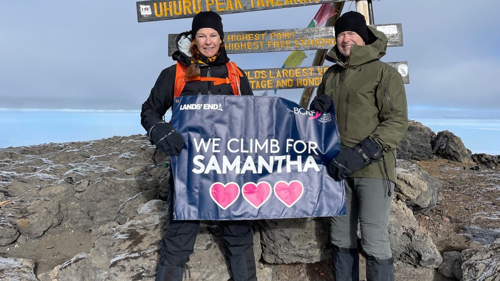 The Griffiths, layered in Lands' End, at the summit of Mt. Kilimanjaro.