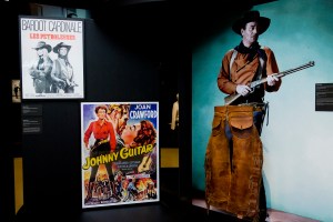 A vignette showing cowboys - and cowgirls.