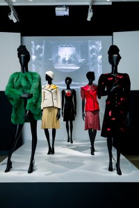 The exhibition mixes designer fashions with lively film clips.