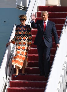 US President Donald Trump and First Lady Melania Trump are seen driving away in the motorcade after arriving on Air Force One at Palm Beach International Airport. 20 Jan 2021 Pictured: Donald Trump and Melania Trump. Photo credit: Larry Marano / MEGA TheMegaAgency.com +1 888 505 6342 (Mega Agency TagID: MEGA727820_001.jpg) [Photo via Mega Agency]