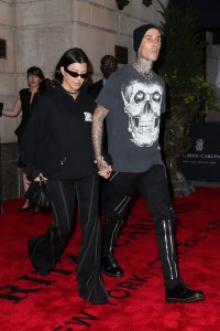 Kourtney Kardashian and Travis Barker seen hand-in-hand as leaving their hotel in NYC. 13 Sep 2021 Pictured: Kourtney Kardashian and Travis Barker. Photo credit: MEGA TheMegaAgency.com +1 888 505 6342 (Mega Agency TagID: MEGA786826_003.jpg) [Photo via Mega Agency]