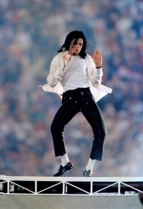 Michael Jackson performs the halftime show during Super Bowl XXVII in Pasadena, California, Sunday, January 31, 1993. Jackson's set included a medley consisting of "Jam", "Billie Jean" and "Black or White." (AP Photo/NewsBase)