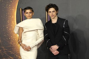 Zendaya, left, and Timothee Chalamet pose for photographers upon arrival at the premiere of the film 'Dune' on Monday, Oct. 18, 2021 in London. (Photo by Vianney Le Caer/Invision/AP)
