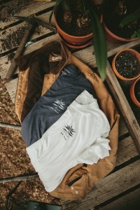 The Taylor Stitch x Rodale Institute For The Common Good capsule collection of T-shirts.
