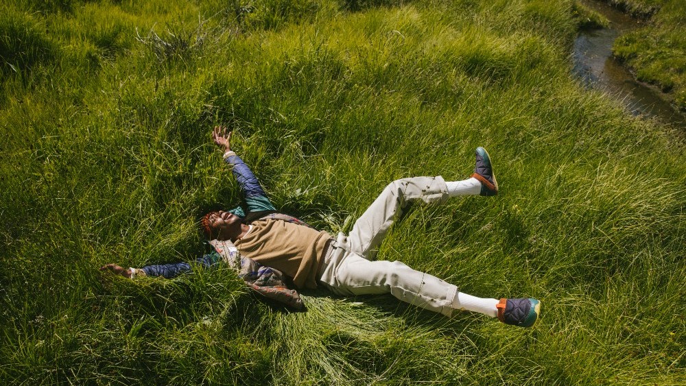 Teva and Cotopaxi have released a collaborative line of outdoor shoes and jackets featuring recycled inputs and complementary design.
