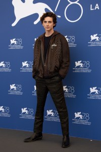 Timothee Chalamet poses for photographers at the photo call for the film 'Dune' during the 78th edition of the Venice Film Festival in Venice, Italy, Friday, Sep, 3, 2021. (Photo by Joel C Ryan/Invision/AP)