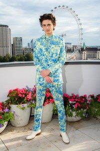 Timothee Chalamet poses for photographers at the photo call for the film 'Dune' in a central London hotel, Sunday, Oct. 17, 2021. (Photo by Joel C Ryan/Invision/AP)