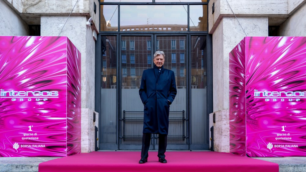 Intercos Group's founder and chairman Dario Ferrari standing in front of the Palazzo Mezzanotte building, which houses the Italian Stock Exchange in Milan.