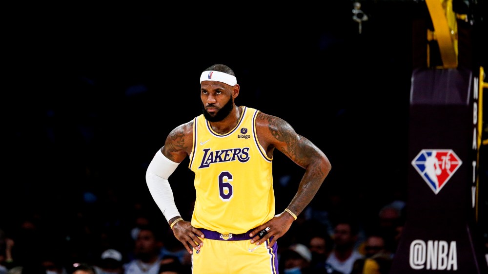 Los Angeles Lakers forward LeBron James (6) looks on during the first half of an NBA basketball game against the Golden State Warriors in Los Angeles, Tuesday, Oct. 19, 2021. (AP Photo/Ringo H.W. Chiu)