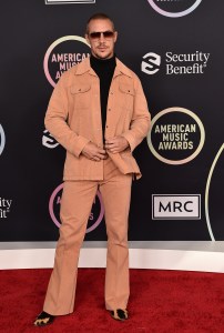 Diplo arrives at the American Music Awards on Sunday, Nov. 21, 2021, at Microsoft Theater in Los Angeles. (Photo by Jordan Strauss/Invision/AP)