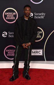 Giveon arrives at the American Music Awards on Sunday, Nov. 21, 2021, at Microsoft Theater in Los Angeles. (Photo by Jordan Strauss/Invision/AP)