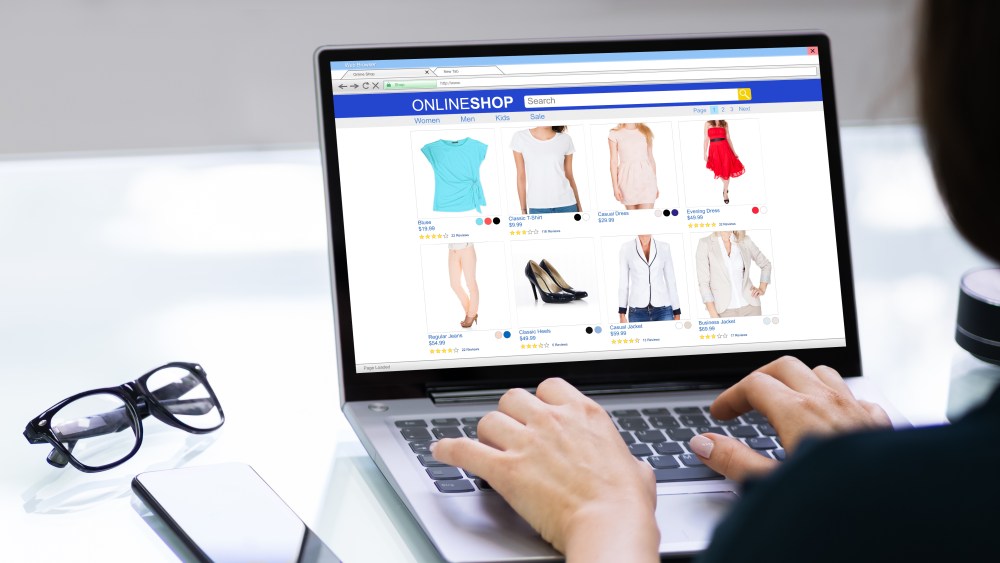 Woman Online Shopping In Ecommerce Store On Laptop