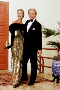 Bob Mackie with a model wearing his design