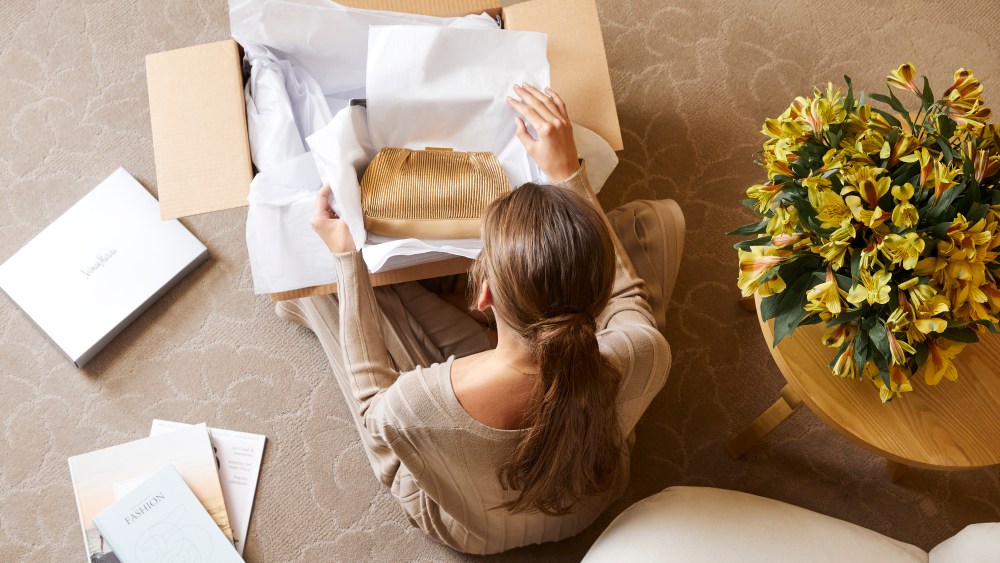 Neiman's is enabling customers to donate fashion to those in need through Gift Back Box.