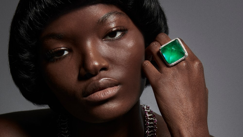 Nina Runsdorf’s sugarloaf emerald, white diamond melee, and 18-karat white gold ring; Van Cleef & Arpels’ Astérisme bracelet from the Sous les Étoiles collection featuring sapphires, black spinels and diamonds set in 18-karat white gold; De Beers Jewellers’ Reflections of Nature Namib Wonder bracelet set in 18-karat yellow gold and 18-karat white gold, and Andreoli Italian Jewelry x Jedora’s 18-karat white gold, ruby and diamond necklace.