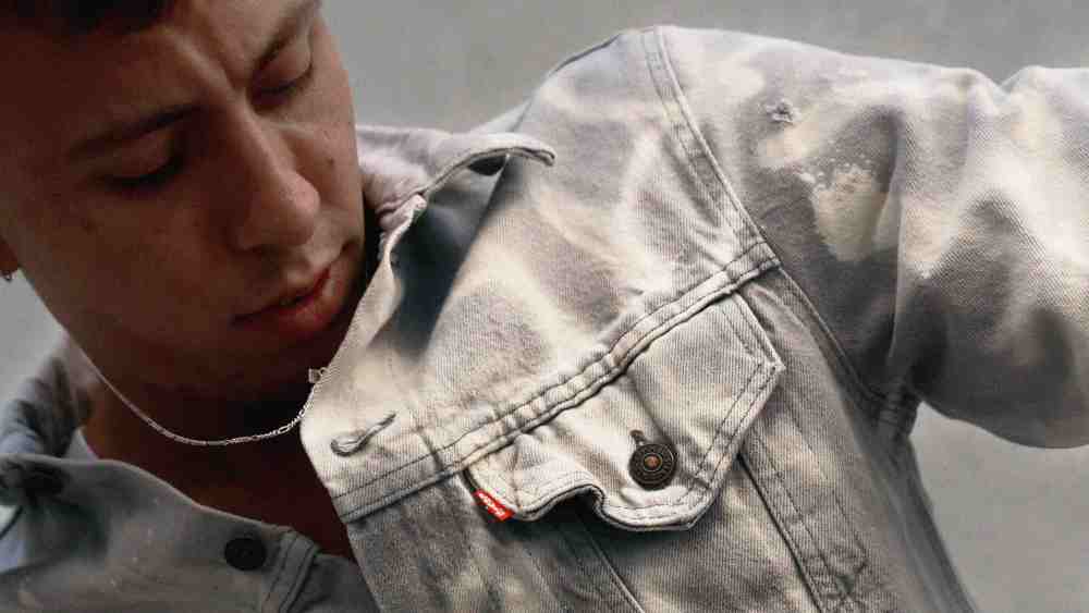 man wearing levi strauss jeans jacket denim