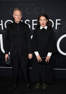 Todd Eckert, left, and Marina Abramovic attend the premiere of "House of Gucci" at Rose Theater at Jazz at Lincoln Center on Tuesday, Nov. 16, 2021, in New York. (Photo by Evan Agostini/Invision/AP)