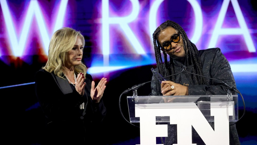 NEW YORK, NEW YORK - NOVEMBER 30: Kathy Hilton and Law Roach speak onstage at the 35th Annual Footwear News Achievement Awards on November 30, 2021 in New York City. (Photo by Jamie McCarthy/Getty Images for Footwear News)