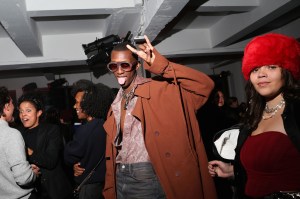 Guests attend a night to celebrate New York hosted by AMI Paris at the Empire State Building