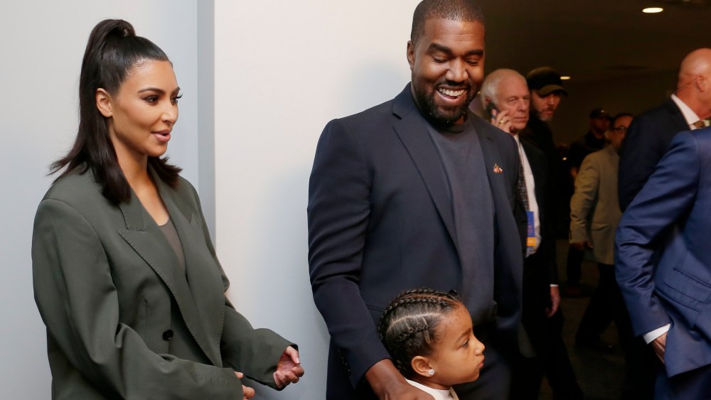 From left, Kim Kardashian West, North West, Kanye West and Sr. Pastor Joel Osteen answers media question after the 11 am service at Lakewood Church Sunday, November 17, 2019, in Houston. (AP Photo/Michael Wyke)