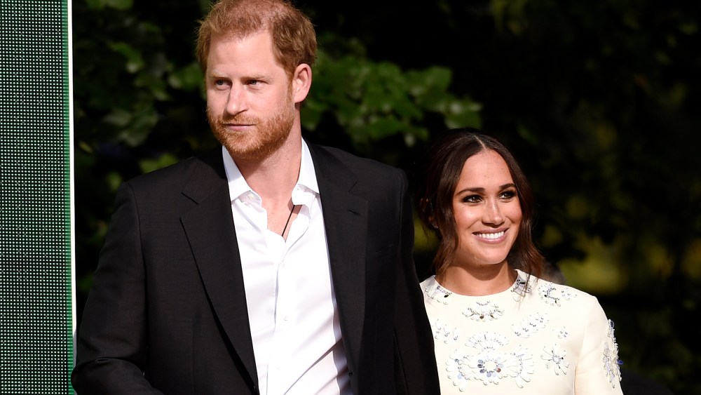 Prince Harry, the Duke of Sussex, left, and Meghan, the Duchess of Sussex speak at Global Citizen Live in Central Park on Saturday, Sept. 25, 2021, in New York. (Photo by Evan Agostini/Invision/AP)