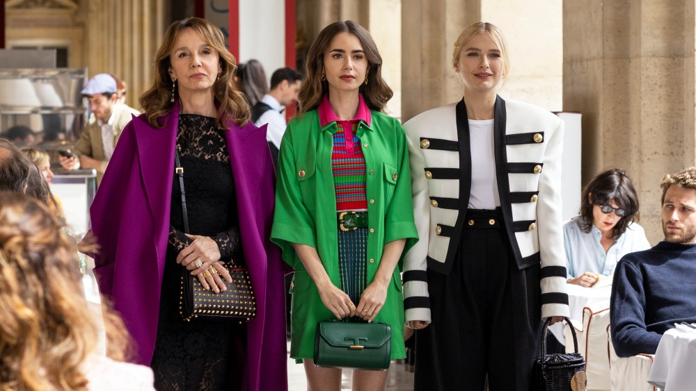 Emily in Paris. (L to R) Philippine Leroy-Beaulieu as Sylvie Grateau, Lily Collins as Emily, Camille Razat as Camille in episode 201 of Emily in Paris. Cr. Carole Bethuel/Netflix © 2021