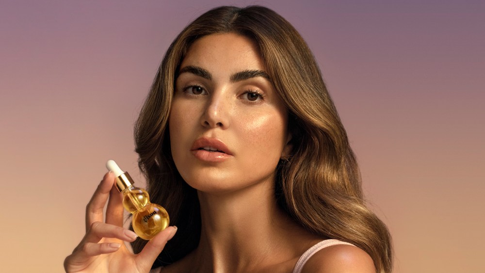 Gisou founder Negin Mirsalehi with the brand's new honey-infused face oil.