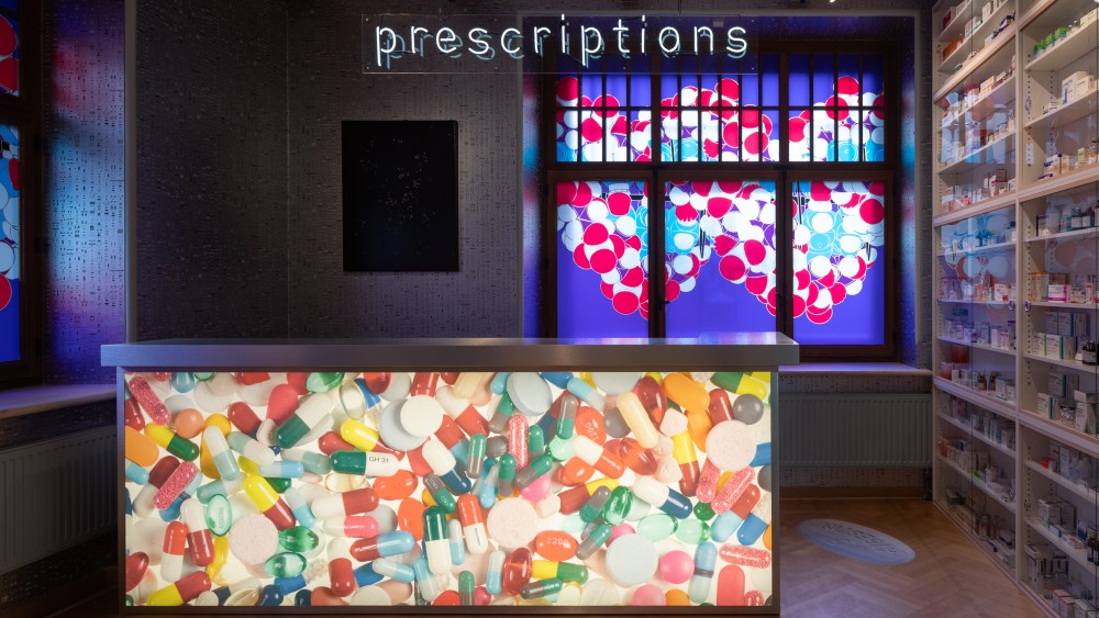 Moscow's Prada Mode featuring Damien Hirst's "Pharmacy" installation.