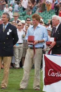 Prince Harry presents the Coronation Cup at Cartier International Polo day at Windsor Great Park, 2006.