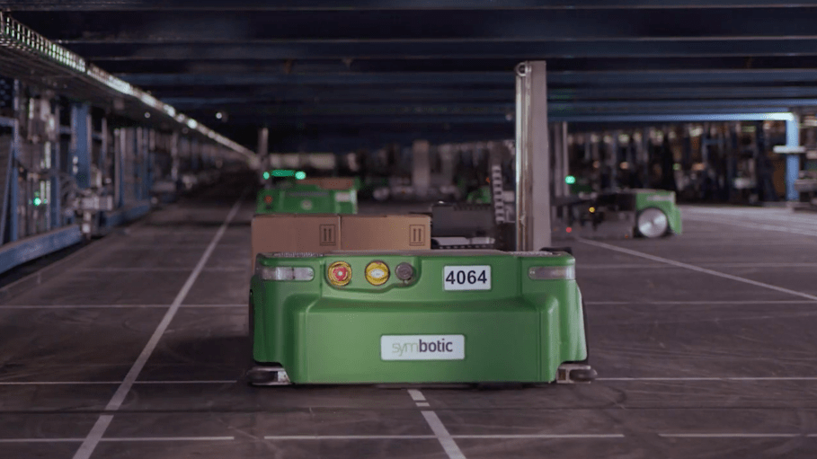 Symbotic's autonomous mobile robots, called Symbots, roam around a warehouse.