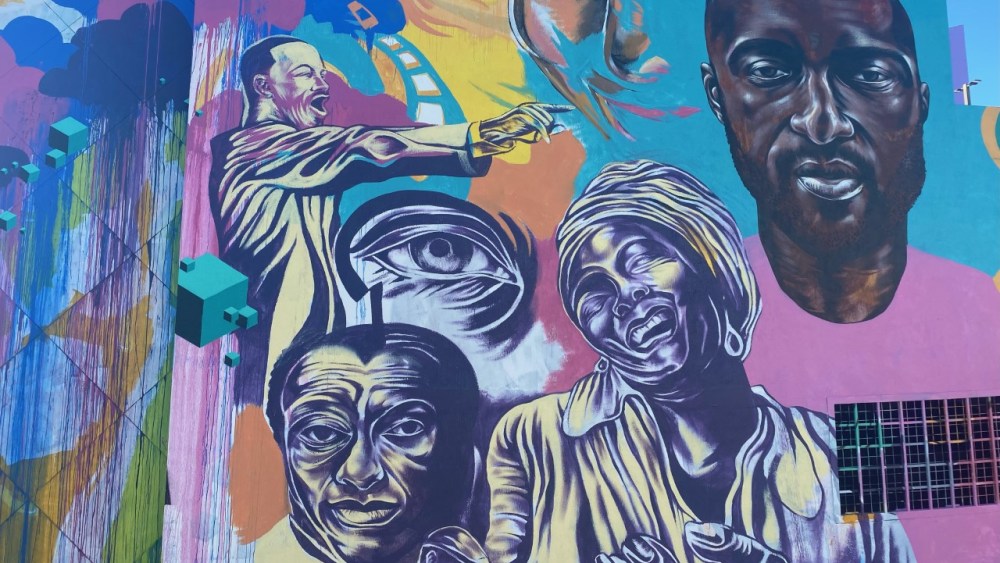 Artist Kyle Holbrook expects to finish the mural featuring Virgil Abloh within the week.