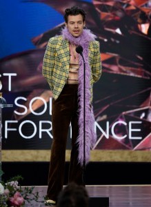Harry Styles accepts the award for best pop solo performance for "Watermelon Sugar" at the 63rd annual Grammy Awards at the Los Angeles Convention Center on Sunday, March 14, 2021. (AP Photo/Chris Pizzello)