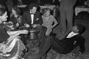 Andre Leon Talley talking to guests at Regine's in New York at a party and group trip to the Muhammad Ali vs Ken Norton boxing match