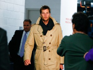 New England Patriots quarterback Tom Brady (12) walks through the tunnel prior to an NFL football game against the Denver Broncos on Sunday, Nov. 29, 2015 in Denver. Denver won 30-24 in overtime. (Aaron M. Sprecher via AP)
