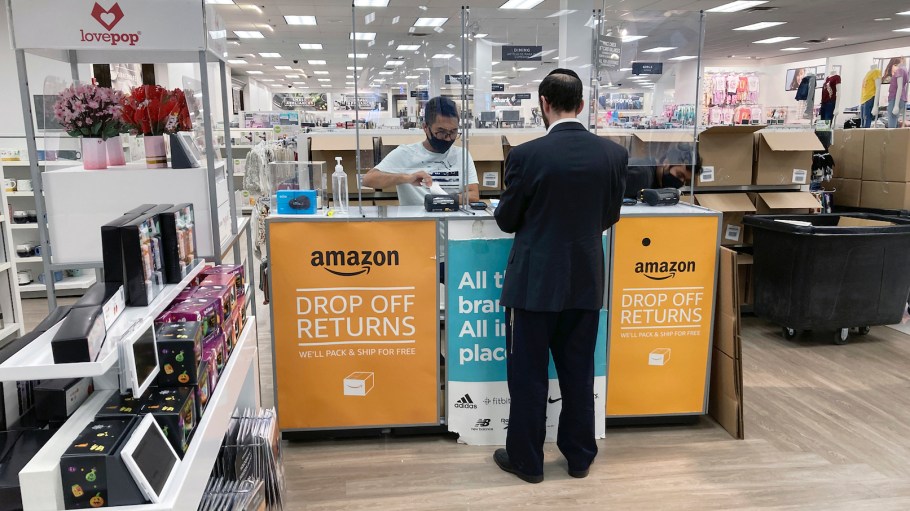 People return items they bought online in person at an Amazon return counter inside a Kohl's department store in Clifton, New Jersey, on Friday, Sept. 3, 2021.