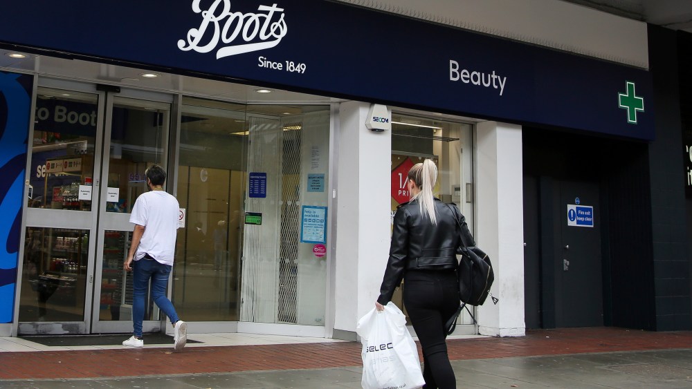 A shopper walks into a branch of Boots. (Photo by Dinendra Haria / SOPA Images/Sipa USA)(Sipa via AP Images)
