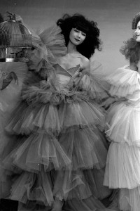 Model Sayoko Yamaguchi on the runway at Thierry Mugler RTW Spring 1984.