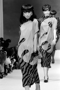 Model Sayoko Yamaguchi on the runway at Thierry Mugler RTW Spring 1983.