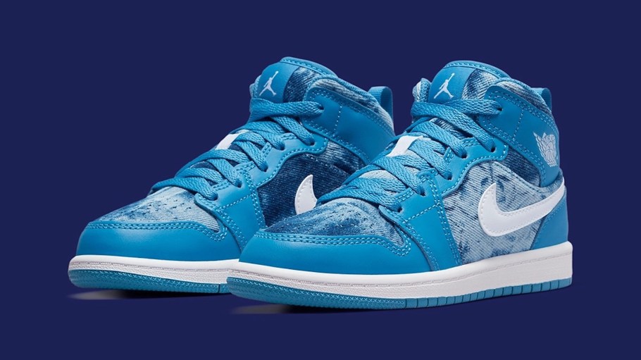 Nike is set to drop a blue Air Jordan 1 Mid sneaker for children featuring washed denim with tie dye effects.