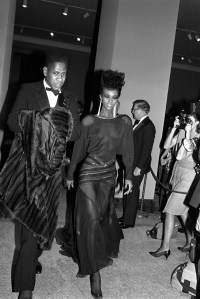 Andre Leon Talley and Iman arriving at the opening of the Metropolitan Museum of Art's exhibition on YSL in 1983