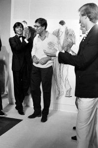 Designer and founder Nino Cerruti walks show finale with models.