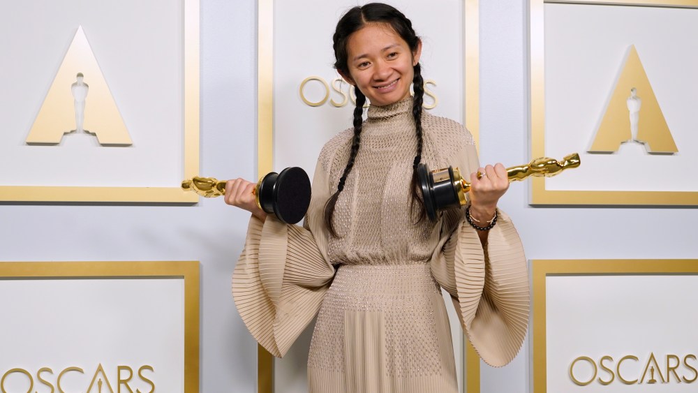 Chloe Zhao, winner of the awards for best picture and director for "Nomadland," poses in the press room at the Oscars on Sunday, April 25, 2021, at Union Station in Los Angeles. (AP Photo/Chris Pizzello, Pool)