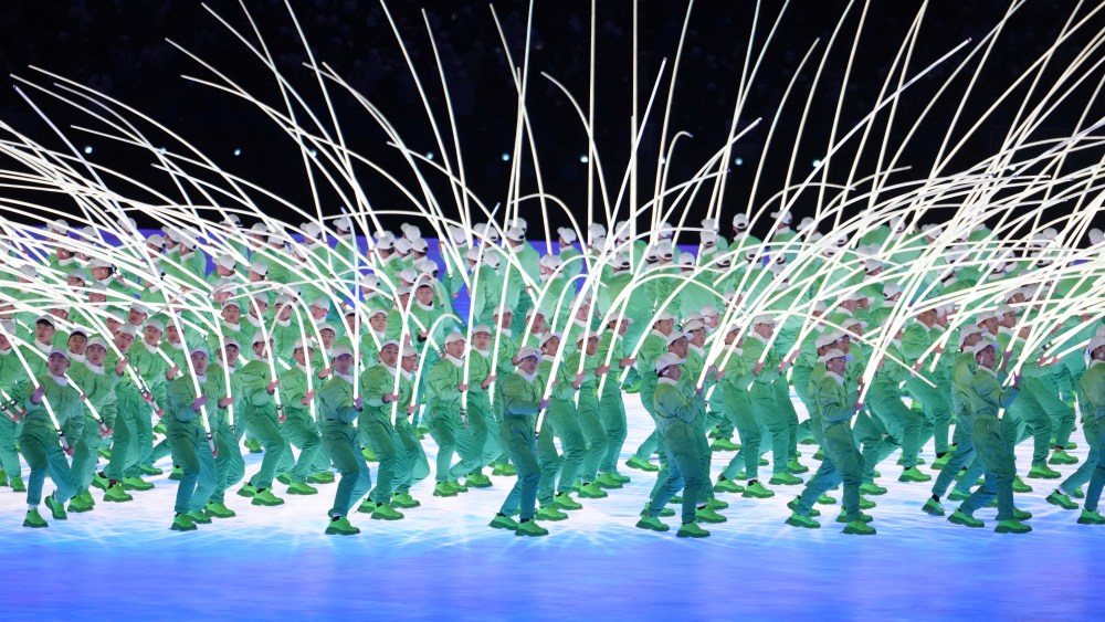 Attendants conduct artistic performance during the Opening Ceremony of the Beijing Winter Olympic Games at the National Stadium, known as the Birds' Nest on Feb. 4, 2022. ( The Yomiuri Shimbun via AP Images )