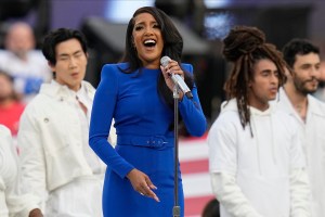Country music artist Mickey Guyton performs the national anthem before the NFL Super Bowl 56 football game between the Los Angeles Rams and the Cincinnati Bengals, Sunday, Feb. 13, 2022, in Inglewood, Calif. (AP Photo/Chris O'Meara)