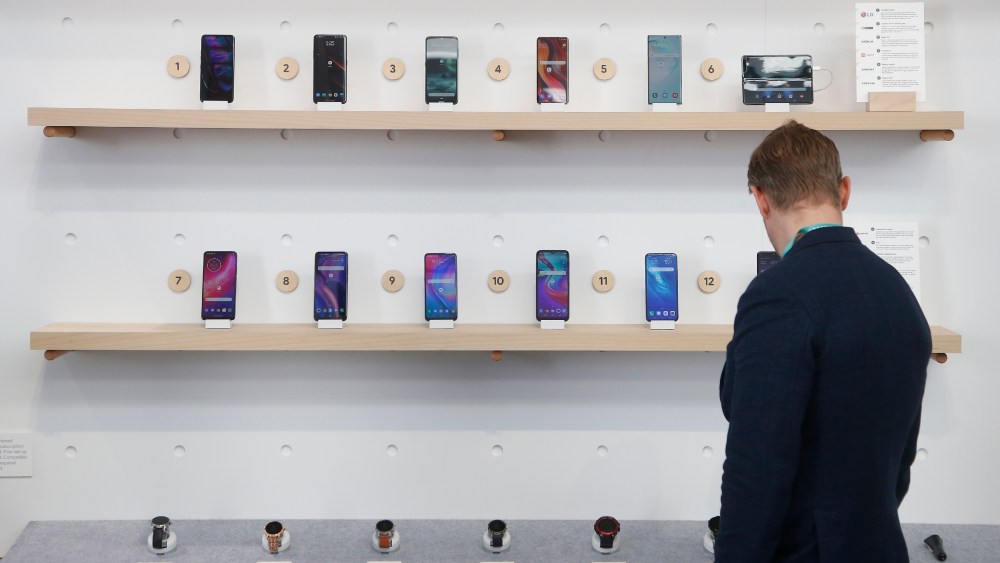 FILE - In this Jan. 8, 2020, file photo, the Google exhibit building shows off a variety of devices with Google Assistant, including Android smartphones and Wear OS smartwatches during the CES tech show in Las Vegas, Nevada, USA. Google is heading to a top European Union court on Monday, Sept. 27, 2021 to appeal a record EU antitrust penalty imposed for stifling competition by abusing the dominance of its Android operating system. (AP Photo/Ross D. Franklin, File)