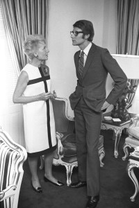Yves Saint Laurent with Yvonne de Peyerimhoff, who wears his Mondrian dress during his American tour stop in Washington, DC on October 27, 1965.