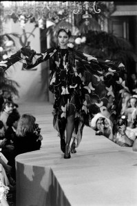 Khirat Bhinder Young walks the runway in Yves Saint Laurent's Couture Fall 1977 collection.