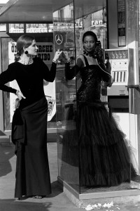 Mounia Orosemane and model in Yves Saint Laurent's RTW Fall 1983 collection.